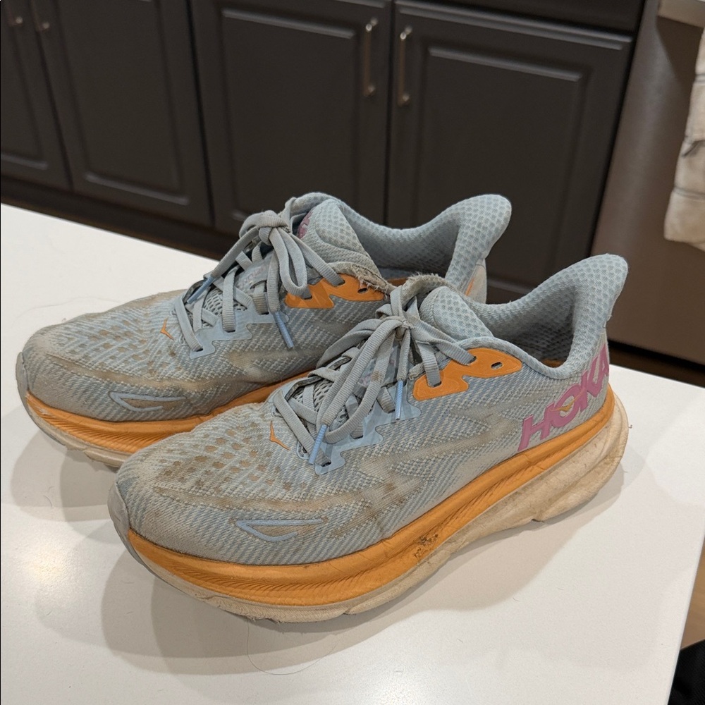 HOKA Women's Light Blue Running Sneakers with Orange Accents AS IS